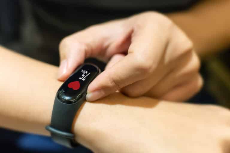 A person measuring heart rate